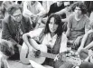  ?? Picture / AP ?? Joan Baez sings in San Francisco in 1967 during what became known as the Summer of Love.