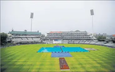  ?? AFP ?? ▪ Heavy rain through Sunday prevented play on the third day of the first Test in Cape Town.