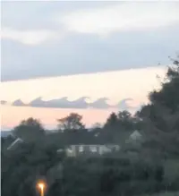  ?? Picture: Pete Harding ?? Wave-shaped clouds above Portmead in Swansea.