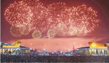  ??  ?? This picture from North Korea’s official Korean Central News Agency (KCNA) shows fireworks ushering in the New Year in Pyongyang. — AFP photo