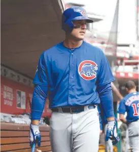  ?? JOHN MINCHILLO/ AP ?? Cubs first baseman Anthony Rizzo, who is on the disabled list with a sore lower back, took swings off a tee Thursday to test the injury.
