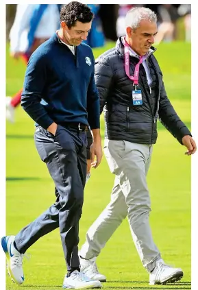  ?? SPORTSFILE ?? Chatting: Paul McGinley (right) believes Rory McIlroy will get back to his best very soon