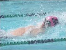  ?? STAFF PHOTO BY ANDY STATES ?? Hawthorne’s Conor Vienneau swims in the boys 15- to 18-year-old 50-meter backstroke on Saturday in the Gators’ meet with the visiting MVP Dolphins. Vienneau was a triple winner for the Gators, who won the Prince-Mont Swim League Division B meet 300-275.