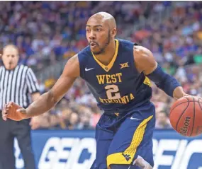  ?? WILLIAM PURNELL/USA TODAY SPORTS ?? Jevon Carter and West Virginia could pose a problem for top-seeded Villanova if they can survive a tough opening mathcup.