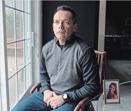  ?? JUSTIN TANG
THE CANADIAN PRESS ?? Tony Rino sits at his home in Ottawa. “We're never going to know who killed my sister,” says Rino.