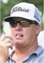  ?? Frank Gunn / Associated Press ?? Charley Hoffman chews on a tee as he ponders his tee shot on No. 16.