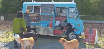  ?? KING-TV ?? The Seattle Barkery, a food truck dedicated to dogs, is a mobile shop where dog owners can get their pets wholesome and natural treats.