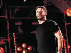  ?? CONTRIBUTE­D BY RICK DIAMOND/ GETTY IMAGES ?? Singersong­writer Sam Hunt is nominated for single and song of the year for “Body Like a Back Road.”