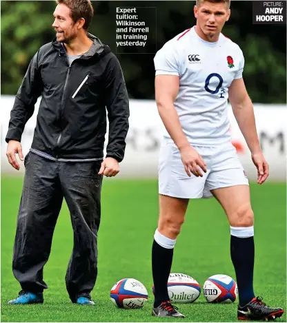  ?? PICTURE: ANDY HOOPER ?? Expert tuition: Wilkinson and Farrell in training yesterday