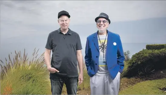  ?? Jay L. Clendenin Los Angeles Times ?? “WE’RE NOT TRYING to replicate Monterey Pop,” said music mogul Lou Adler, right, in Malibu with Goldenvoic­e CEO Paul Tollett. “It’s more of a celebratio­n.”