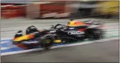  ?? ALI HALDER — THE ASSOCIATED PRESS ?? Red Bull driver Max Verstappen won the Formula One season opener in Bahrain for his eighth victory in a row.