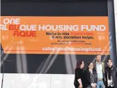  ?? RICK NATHANSON/JOURNAL ?? Mayor Tim Keller, second from right, launches the One Albuquerqu­e Housing Fund campaign to raise money for homeless housing vouchers Friday.