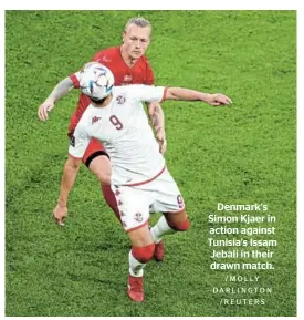  ?? /MOLLY DARLINGTON /REUTER S ?? Denmark’s Simon Kjaer in action against Tunisia’s Issam Jebali in their drawn match.