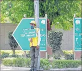  ?? HT FILE ?? A volunteer promotes oddeven car rationing scheme in April 2016, the second time curbs on car use were implemente­d in Delhi.