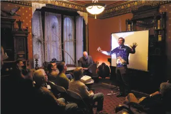  ?? Carlos Avila Gonzalez / The Chronicle ?? Colin Bishopp previews his film “Snaggletoo­th” for guests at the William Westerfeld House.