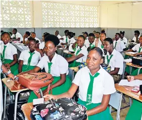  ??  ?? Grade 11 students in a math class at Oracabessa High School, St Mary.