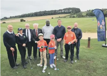  ??  ?? Former Sunderland footballer Gary Bennett, fourth from right, with members of Wearside Golf Club.