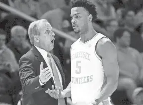  ?? BRIANNA PACIORKA/NEWS SENTINEL ?? Tennessee coach Rick Barnes talks to Tennessee guard Josiah-jordan James (5) during Saturday’s game against Auburn.