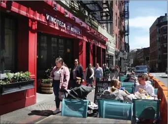  ?? NANCY LANE — BOSTON HERALD ?? North End restaurant owners have been calling on Mayor Michelle Wu to reverse the outdoor dining ban.