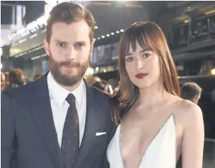  ?? Pictures: DAVID LIVINGSTON/ GETTY & KOBAL ?? Stars Dakota and Jamie at Fifty Shades Of Grey’s London premiere last night