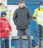  ??  ?? Dundee boss James Mcpake can’t disguise how he feels