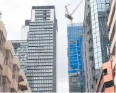  ?? SOMCHAI POOMLARD ?? Condominiu­ms and other buildings are under constructi­on in the Phloenchit area, but the suburbs are seeing higher price growth for new units.