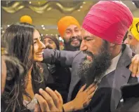  ?? CP PHOTO ?? Jagmeet Singh celebrates with supporters after winning the first ballot in the NDP leadership race to be elected the leader of the federal New Democrats in Toronto on Sunday.