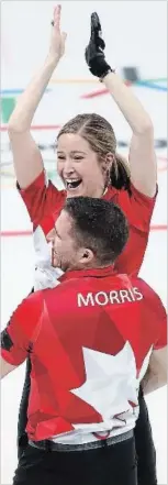  ?? JAMIE SQUIRE GETTY IMAGES ?? John Morris and Kaitlyn Lawes of Canada celebrate their win over Switzerlan­d to win the gold medal in curling mixed doubles.