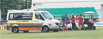  ??  ?? Darwin Buffaloes' Tai Martin-Page is taken to hospital with a suspected spinal injury after a collision during their game against Wanderers at TIO Stadium yesterday