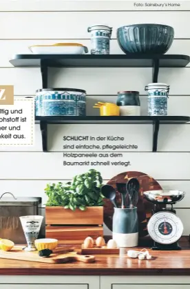  ?? Foto: Sainsbury’s Home ?? SCHLICHT In der Küche sind einfache, pflegeleic­hte Holzpaneel­e aus dem Baumarkt schnell verlegt.