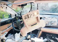  ?? PROVIDED BY LINDA MOSEN ?? A BEAR broke into this car in Canton in May and trashed the inside as it tried to get out.