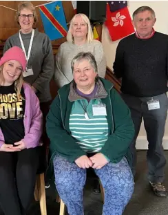  ?? Picture: Ji-Min Lee ?? COMMUNITY: Lorraine Smith (back, second to right) has credited Helping Hand organisers Sarah O’Neill (front left) and Rachel Walker (front middle) for changing her life.