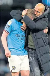 ?? ?? Pep Guardiola hugs Kevin de Bruyne
