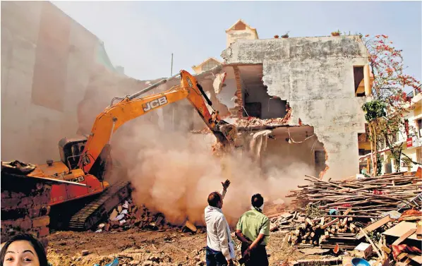  ?? ?? Afreen Fatima, left, claims her house in Prayagraj was bulldozed in retributio­n for her opposition to the BJP. It came after violent protests over remarks made about the Prophet Mohammed