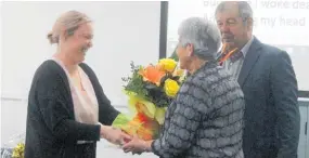  ?? Photo / Alyssa Smith ?? Gloria Webby was presented with flowers acknowledg­ing her contributi­on to the Stratford Positive Aging Group.