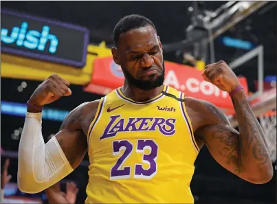  ?? (AP/Mark J. Terrill) ?? LeBron James of the Los Angeles Lakers was named The Associated Press Male Athlete of the Year for the fourth time Saturday, defeating Kansas City Chiefs quarterbac­k Patrick Mahomes and Formula One driver Lewis Hamilton for the award.