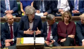  ?? — AP ?? Britain’s Prime Minister Theresa May speaks during the scheduled Prime Minister’s Questions in the House of Commons in London on Wednesday.