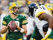  ?? STACY REVERE/GETTY IMAGES ?? Aaron Rodgers is the best fantasy quarterbac­k available, but the difference between No. 1 and No. 12 at the position is not that vast.