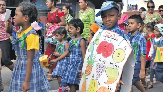  ?? Photo: Shratika Naidu ?? Students marching through Labasa Town during the launch of the National Early Childhood Education Week celebratio­n.