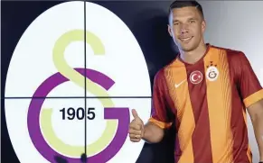  ??  ?? Sealed: Galatasara­y’s lukas Podolski signed a RM16.7mil contract with the Turkish champions.