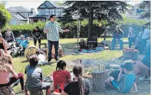  ?? RACHEL EMMANUEL/THE ST. CATHARINES STANDARD ?? NRNC executive director Chris Shawanoo speaks to a group of students from Soaring Eagles school about fire-keeping teachings.