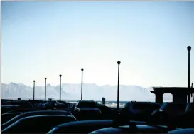  ?? A view of the distant mountains from Surfer’s Corner. The parking lot is always crowded, with beach enthusiast­s and surfers vying for parking and waves. ??