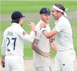  ?? Picture: PA. ?? Stuart Broad, right, celebrates a wicket with Rory Burns and Ben Stokes.