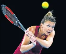  ?? Picture: REUTERS/DAVID GRAY ?? TOP CONTENDER: Romania’s Simona Halep hits a shot during a practice session for the Australian Open