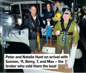  ?? ?? Peter and Natalie Hunt on arrival with Sonnen, 11, Remy, 7, and Max – the broker who sold them the boat