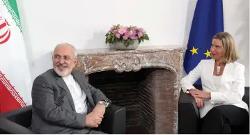  ?? (Thierry Monasse/Reuters) ?? IRAN’S FOREIGN MINISTER Mohammad Javad Zarif attends a meeting yesterday with European Union foreign policy chief Federica Mogherini at the EU Council in Brussels.