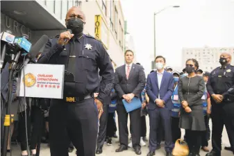  ?? Photos by Jessica Christian / The Chronicle ?? Oakland Police Department Chief LeRonne Armstrong said recent Chinatown attacks “shocked our conscience.” He added an extra foot patrol to the area in the wake of recent violence.