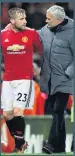  ??  ?? TOUGH LOVE Shaw with boss Mourinho