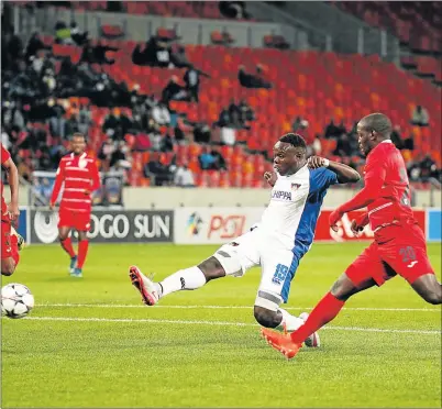  ?? Picture: GALLO IMAGES) ?? IN RIGHT DIRECTION: Rhulani Manzini of Chippa United scores a goal during the premier league match against Free State Stars at the Nelson Mandela Bay Stadium in PE on Tuesday. Chippa’s 2-1 win has bolstered confidence for the knockout cup match against...