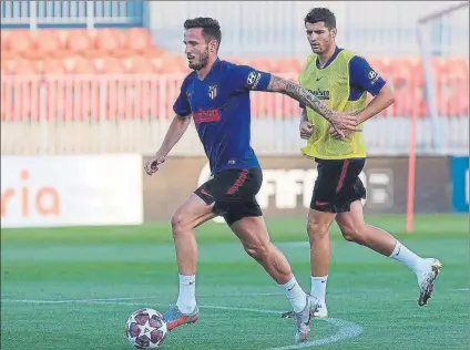  ?? FOTO: EFE ?? Saúl Ñíguez y Morata, durante un entrenamie­nto del Atlético de Madrid esta semana